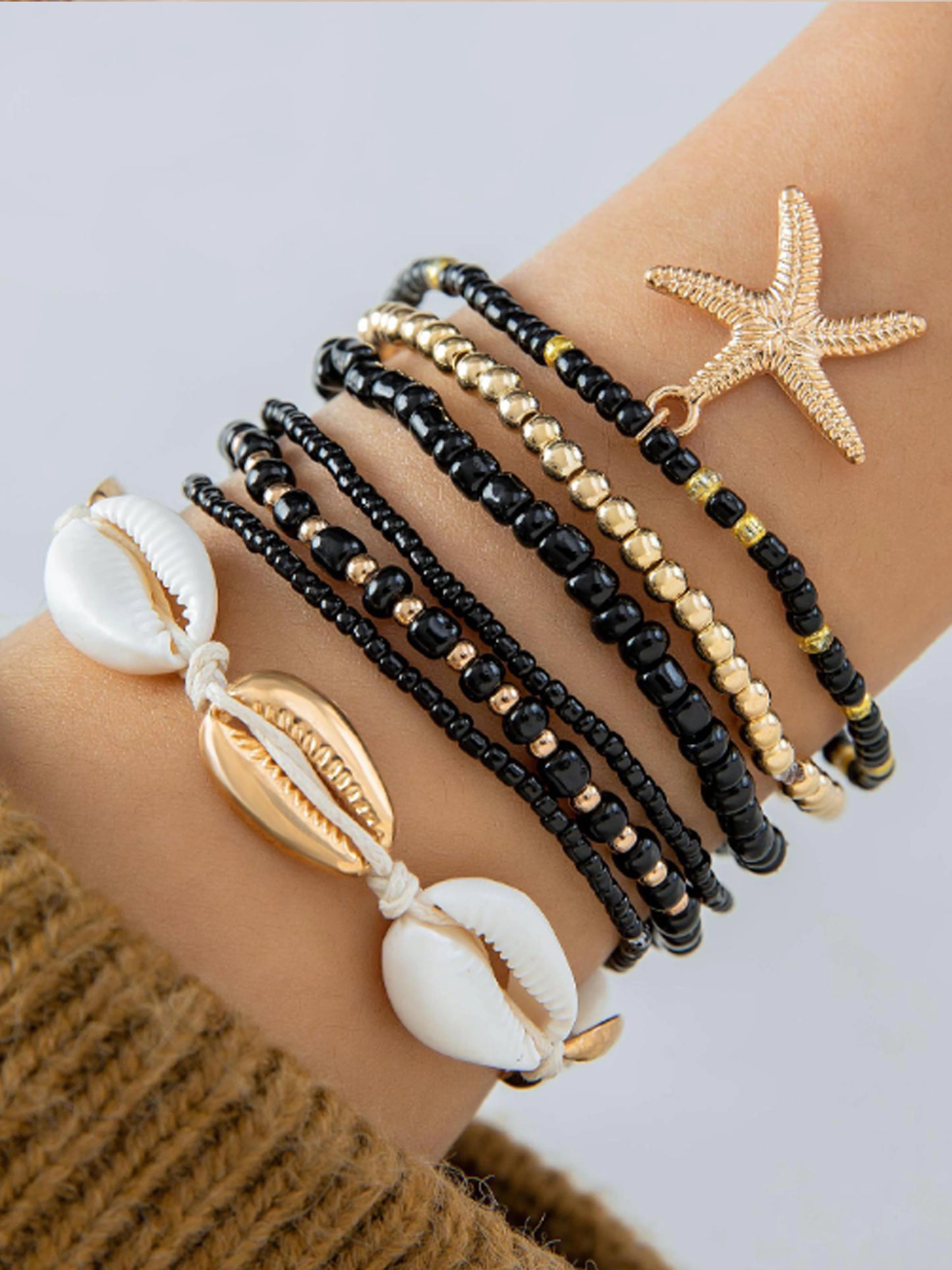 Fashion trend summer fresh seashell starfish rice bead bracelet 7-piece set, beach travel holiday deluxe sense of everything chi